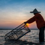 Evening Fisherman - Source: Suwanput, Somsak. Silhouette Fisherman Evening Lamps. Digital Image. Shutterstock. [Date Published Unknown]